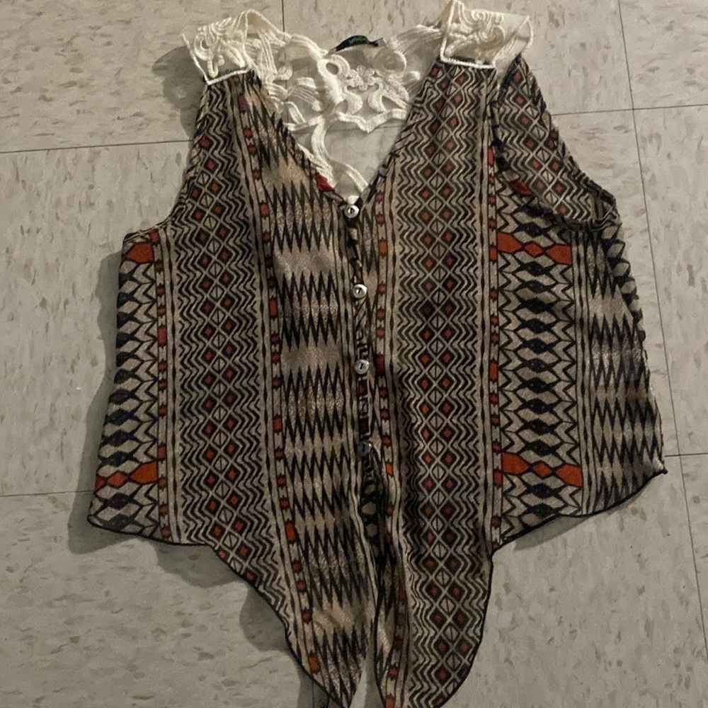 See-through blouse, no rips, no snacks design in the back